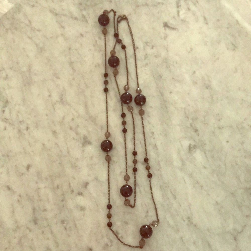 Long continuous necklace.